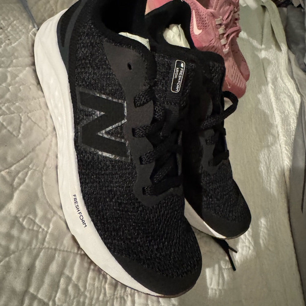 New Balance Women's Black and White Sneakers